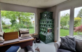 Biofire Kachelofen mit Kaufmann Keramik. Geplant und gebaut von Meinofenwerk Biofire AG.